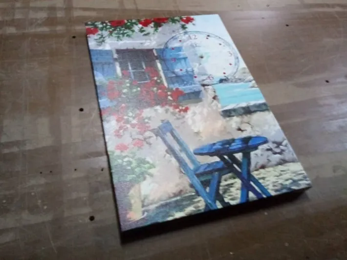 Mavi Sandaye Masa Çiçekli Ev ve Manzaralı Kanvas Tablo
